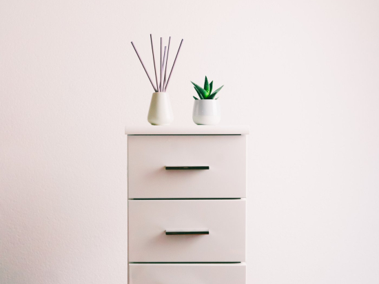 White narrow commode